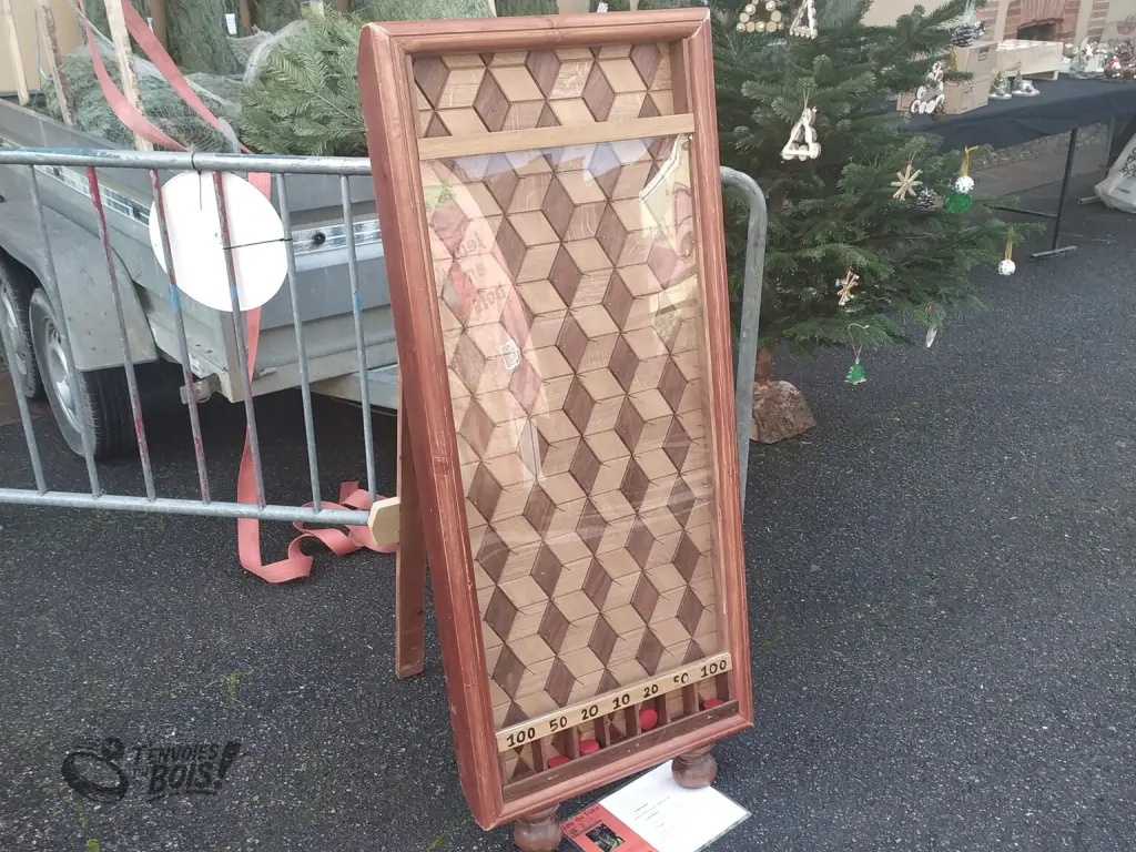 Un gros plan du jeu du fakir prêt à jouer. Photo prise lors du marché de Noël de Lombez en décembre 2025.